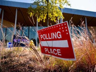 A polling place sign is displayed outside a polling location on the first day of Virginia's in-person early voting at Long Bridge Park Aquatics and Fitness Center on September 20, 2024, in Arlington, Virginia.