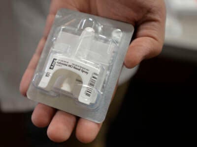 Andre Hanna, a local pharmacist, carries Narcan in Long Beach, California, on June 15, 2023.