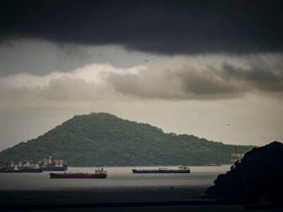 Cargo ships wait before entering the Panama Canal in Panama City, on June 13, 2024.