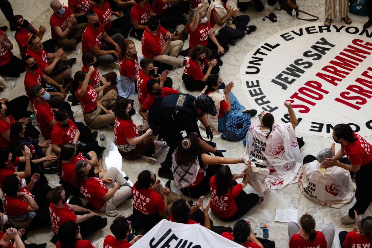 Demonstrators from Jewish Voice for Peace protest Israel's genocidal war on Gaza at the Cannon House Office Building on July 23, 2024, in Washington, D.C.