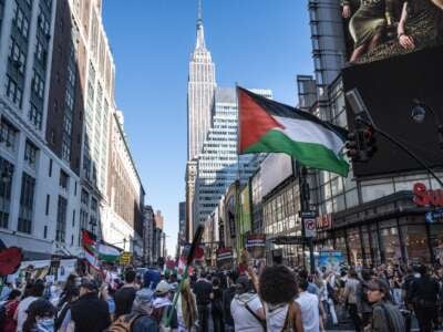 Pro-Palestinian protesters rally in support of Gaza and Lebanon in Times Square on October 5, 2024, in New York City.