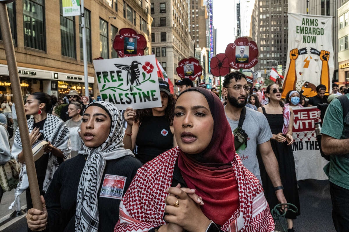 Demonstrators rally in solidarity with the people of Gaza and Lebanon in Times Square on October 5, 2024, in New York City.