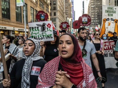 Demonstrators rally in solidarity with the people of Gaza and Lebanon in Times Square on October 5, 2024, in New York City.