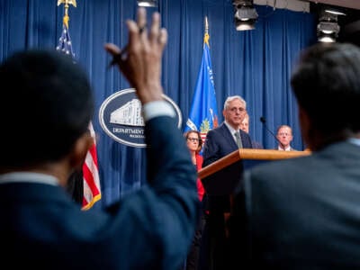 U.S. Attorney General Merrick Garland takes a question from a reporter during a news conference at the Justice Department on October 10, 2024, in Washington, D.C.