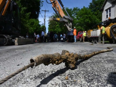 Section of lead pipe that supplied drinking water to a Campbell Ave. home is removed on May 20, 2024, in Troy, New York.