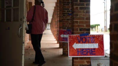 People arrive to cast their votes on the first day of early voting at East Point First Mallalieu United Methodist Church on October 15, 2024, in Atlanta, Georgia.