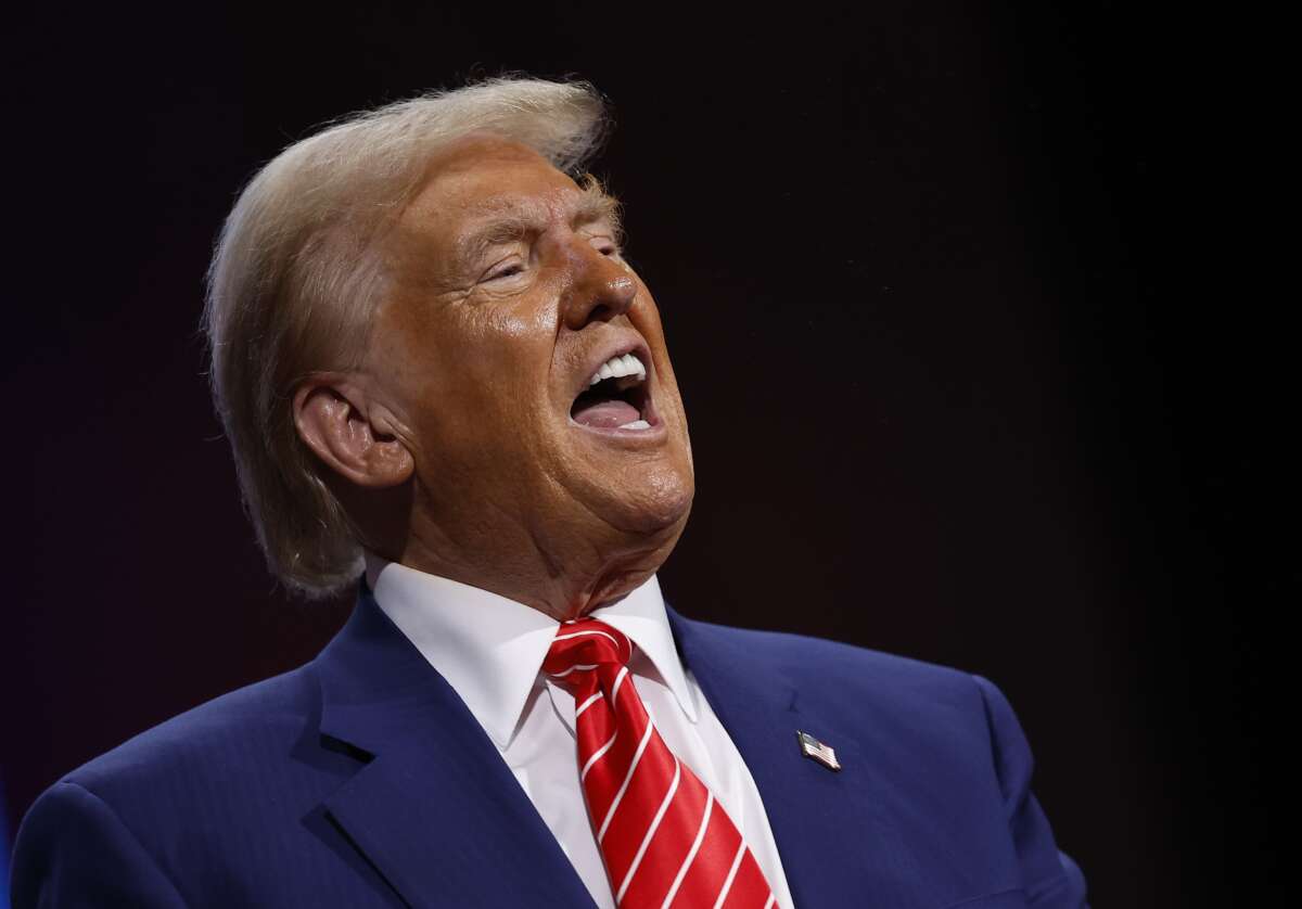 Former President Donald Trump delivers remarks during a campaign rally at the Cobb Energy Performing Arts Centre on October 15, 2024, in Atlanta, Georgia.