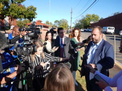 Texas Rep. John Bucy III speaks to the media outside the Texas State Penitentiary at Huntsville Walls Unit, on October 17, 2024, in Huntsville, Texas.