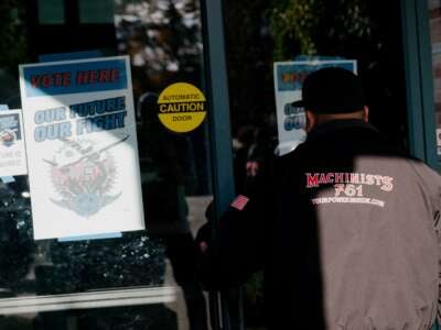 Boeing Machinists Union members enter the IAM District 751 Union Hall to vote on the latest contract presented by the airline giant after weeks of striking, in Seattle, Washington, on October 23, 2024.