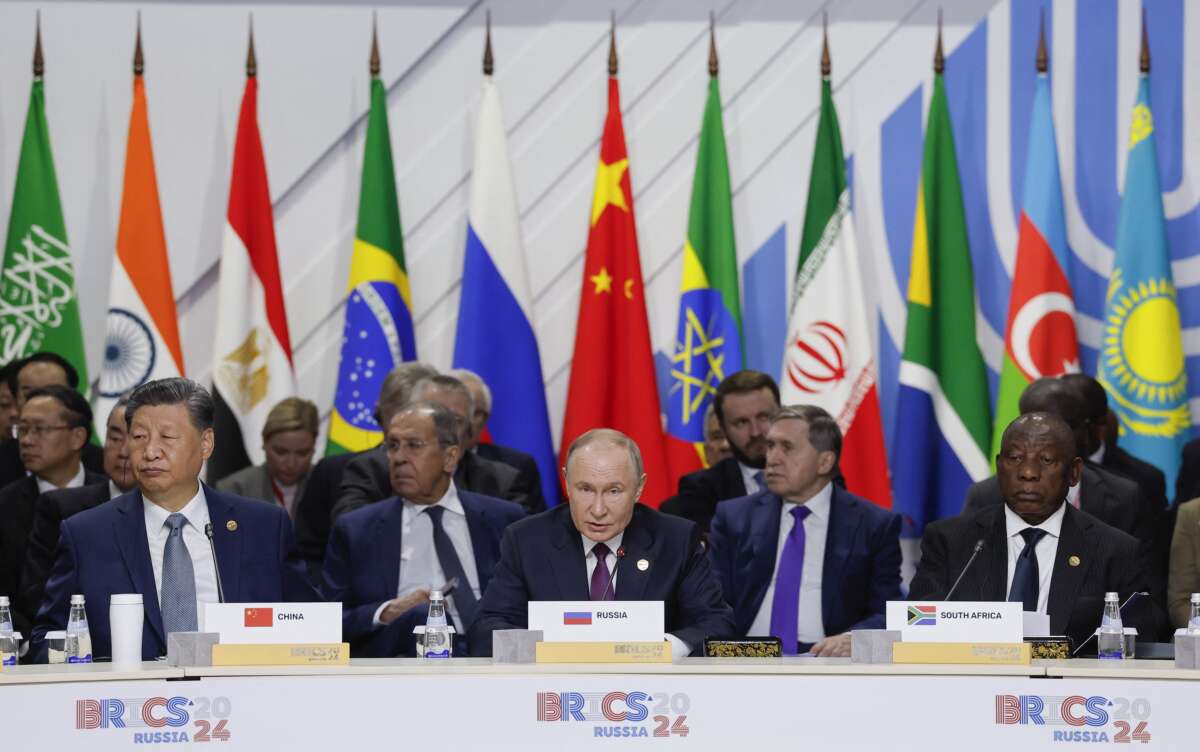 Officials -- including South African President Cyril Ramaphosa, Russian President Vladimir Putin and Chinese President Xi Jinping -- attend a plenary session in the outreach/BRICS Plus format at the BRICS summit in Kazan, Russia, on October 24, 2024.