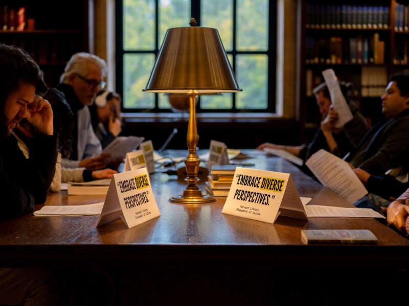 Harvard professors hold a silent study session in the university’s central library on October 16, 2024.