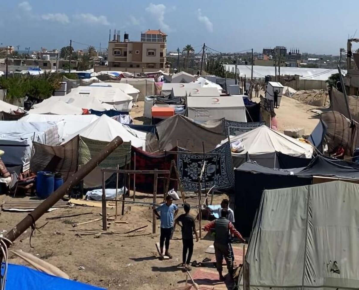 Everywhere you look in Aya Ashwan’s hometown of Rafah is a sea of tents. Thankfully, Ashwan and her family are able to live in her in-laws’ house in Deir al-Balah, in the middle of the Strip. Twenty people are living in that one house.