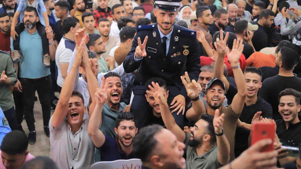 Shot in June 2023, this photo shows Abdallah Aljazzar’s brother Nour just after graduation from police college. Nour is shown among family members and friends at a celebration party. Abdallah has not seen Nour since May 2024.