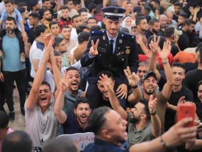 Shot in June 2023, this photo shows Abdallah Aljazaar’s brother Nour just after graduation from police college. Nour is shown among family members and friends at a celebration party. Abdallah has not seen Nour since May 2024.