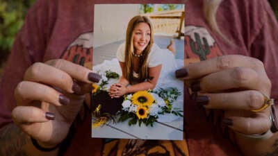 Candace Fails holds a photograph of her daughter Nevaeh Crain, who died last year after seeking help from two hospitals for pregnancy complications.