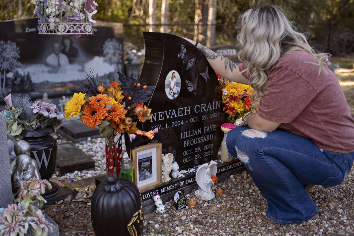 Fails visits the grave of her daughter and granddaughter, Lillian Faye Broussard, in Buna, Texas.