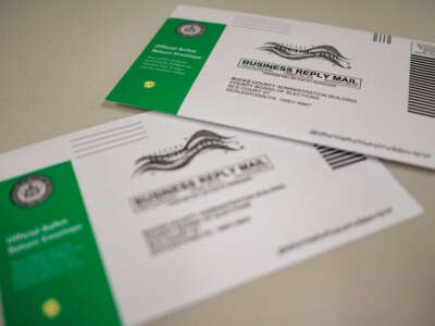 Mail-in ballots are displayed during a processing demonstration at the Board of Elections office on September 30, 2024, in Doylestown, Pennsylvania.