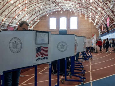 People vote at a polling station in the Brooklyn borough of New York City on Election Day, November 5, 2024.