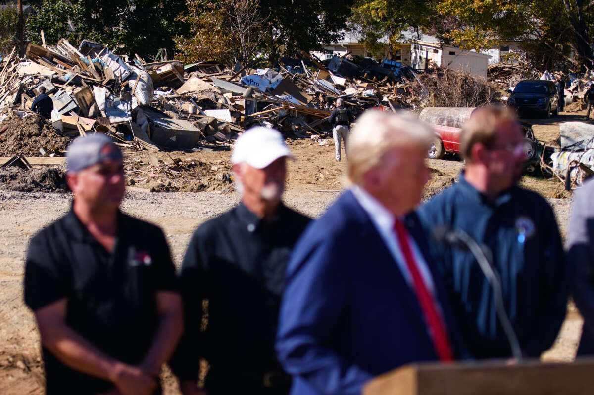 Donald Trump and associates deliver remarks in front of debris from hurricane Helene