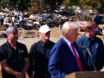 Donald Trump and associates deliver remarks in front of debris from hurricane Helene