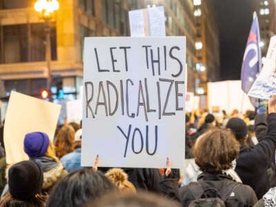 People march during the Day After Election Rally, Chicago, Illinois, on November 6, 2024.