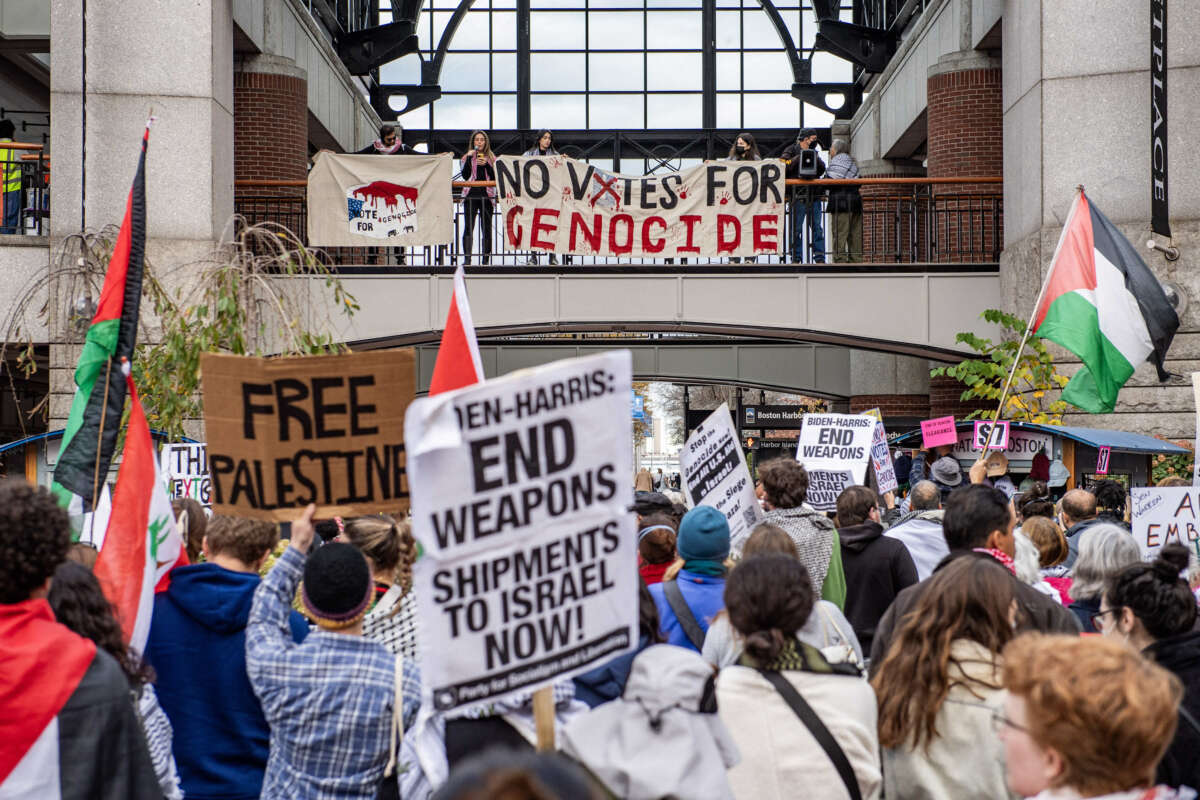 Pro-Palestinian demonstrators gather at Faneuil Hall Marketplace during a "No Votes for Genocide" rally organized by the Boston Coalition for Palestine ahead of the U.S. general election, in Boston, Massachusetts, on November 2, 2024.