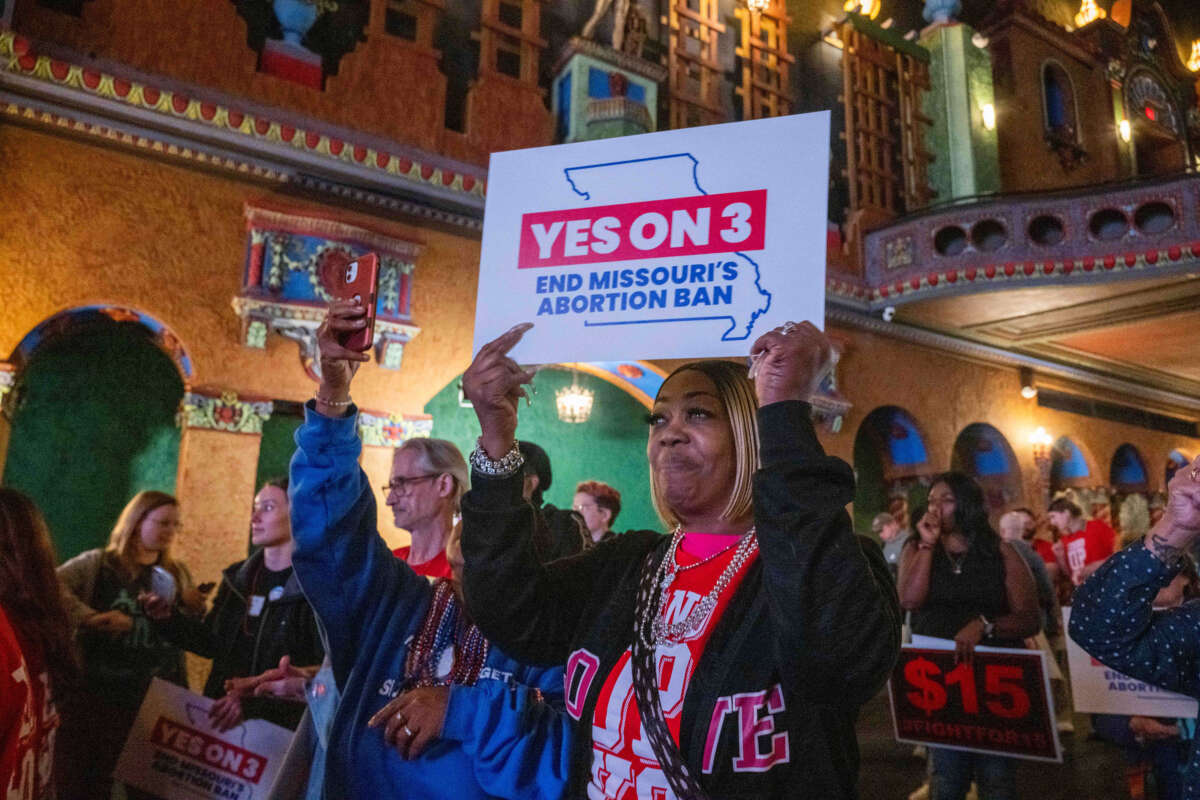 Supporters and organizers of Amendment 3 and Proposition A celebrate the results of the election at a watch party at Uptown Theater in Kansas City, Missouri, on Election Day, November 5, 2024.