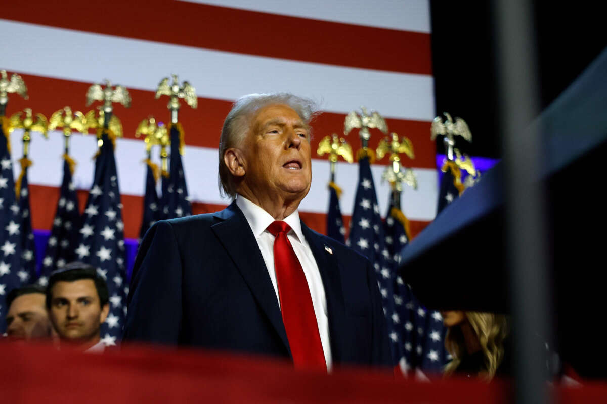 Republican presidential nominee, former President Donald Trump arrives to speak during an election night event at the Palm Beach Convention Center on November 6, 2024, in West Palm Beach, Florida.