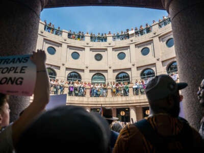 People protest against bills HB 1686 and SB 14 during a 