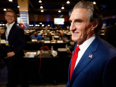 North Dakota Gov. Doug Burgum speaks to reporters in the spin room at the presidential debate between Republican presidential nominee, former President Donald Trump, and Democratic presidential nominee, Vice President Kamala Harris, at the Pennsylvania Convention Center on September 10, 2024, in Philadelphia, Pennsylvania.