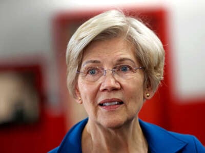 Sen. Elizabeth Warren speaks at Direct Tire & Auto Service in Watertown, Massachusetts, on February 22, 2024.