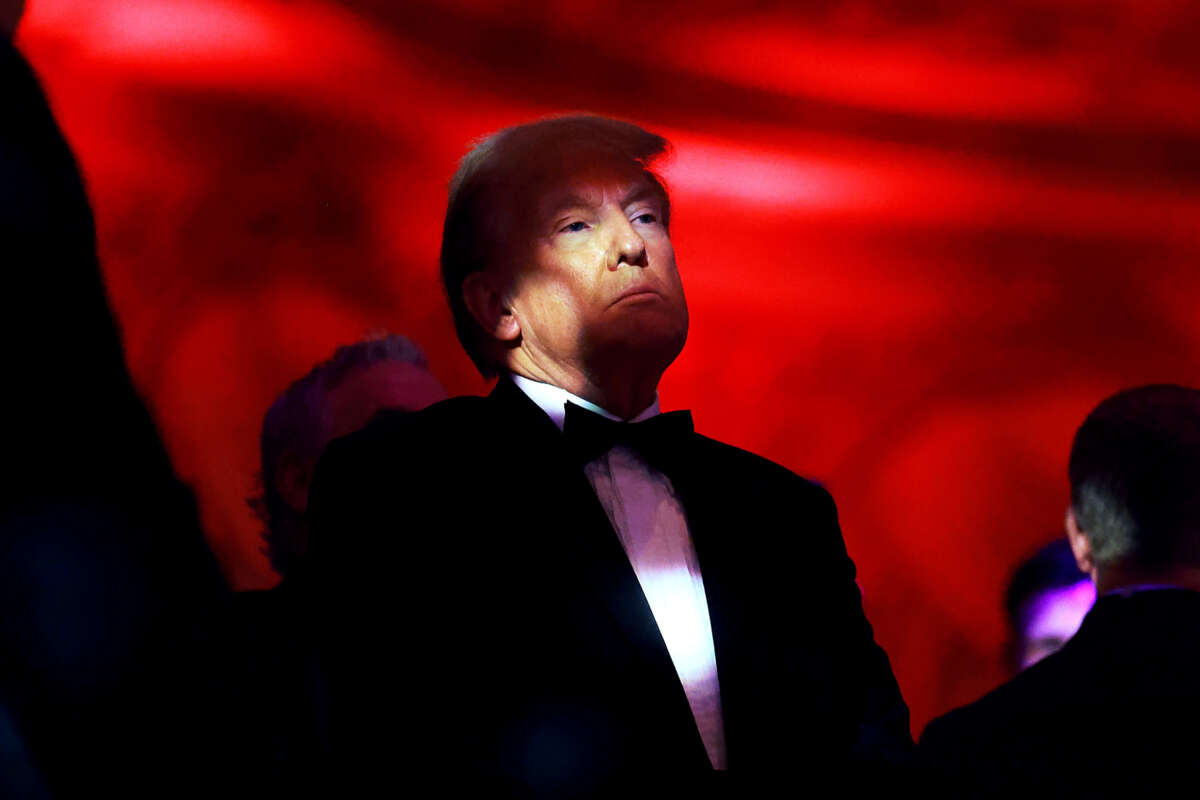 Donald Trump against a red background