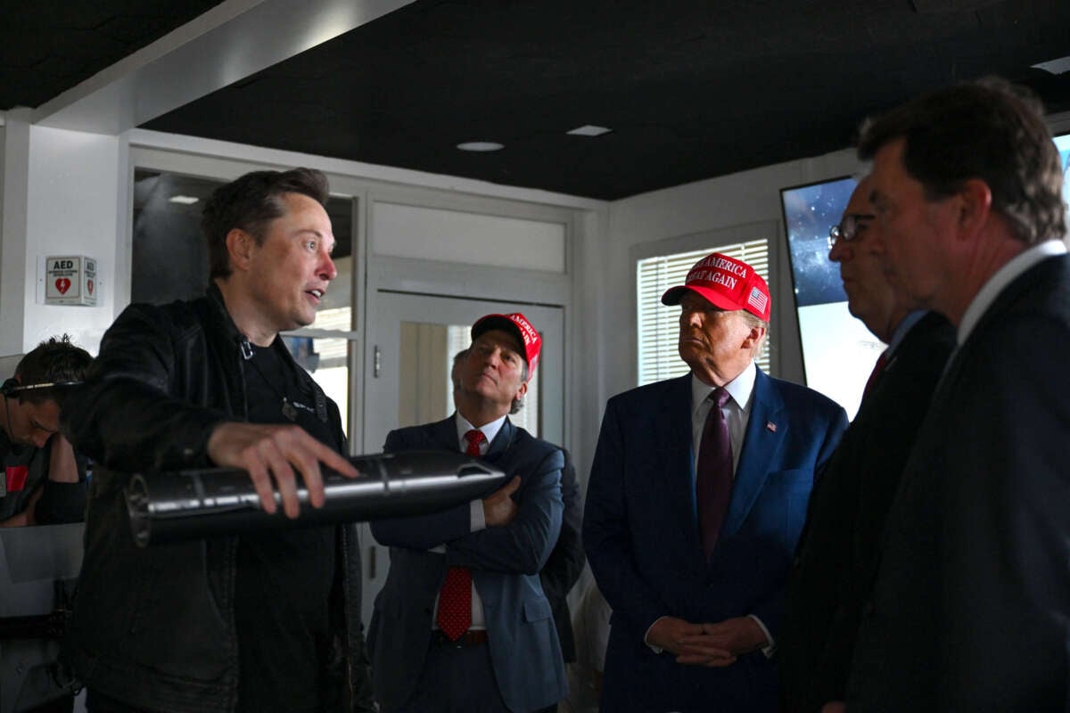 Elon Musk gives a tour to President-elect Donald Trump and lawmakers of the control room before the launch of the sixth test flight of the SpaceX Starship rocket on November 19, 2024, in Brownsville, Texas.