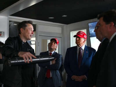 Elon Musk gives a tour to President-elect Donald Trump and lawmakers of the control room before the launch of the sixth test flight of the SpaceX Starship rocket on November 19, 2024, in Brownsville, Texas.