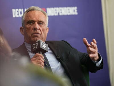 Robert F. Kennedy, Jr. hosts a fireside chat with rapper and producer Eric B. at The Gentleman's Factory on February 18, 2024, in New York City.