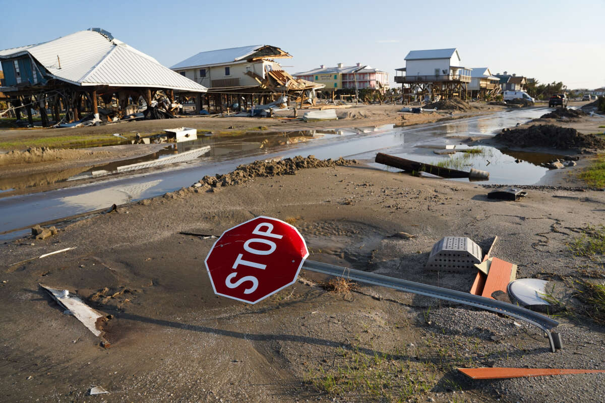 A bent stop sign in a storm damaged neighborhood after Hurricane Ida on September 4, 2021, in Grand Isle, Louisiana.