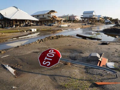 A bent stop sign in a storm damaged neighborhood after Hurricane Ida on September 4, 2021, in Grand Isle, Louisiana.