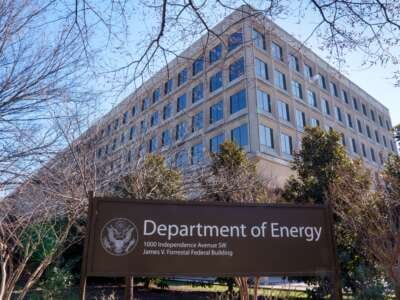 The U.S. Department of Energy headquarters is seen behind the sign marking the location of the building on February 9, 2024, in Washington, D.C.