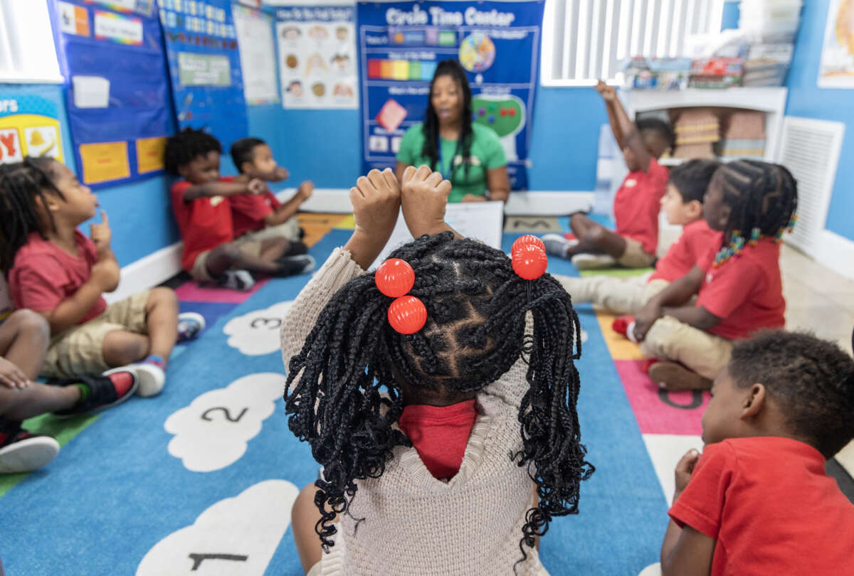 Voluntary pre-K teacher Kaira Cawthon demonstrates bringing together single words into compound words during class at Park Avenue Child Care in Apopka, Florida, on October 1, 2024.