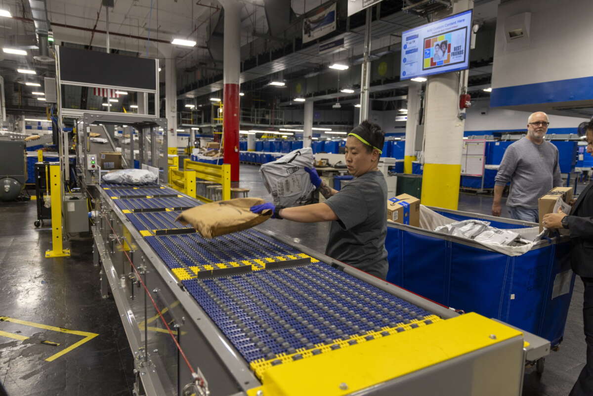 United State Postal Service processing clerk Debby Cheng at the U.S. Post Office Sorting and Delivery Center in Hicksville, New York, on October 9, 2024.