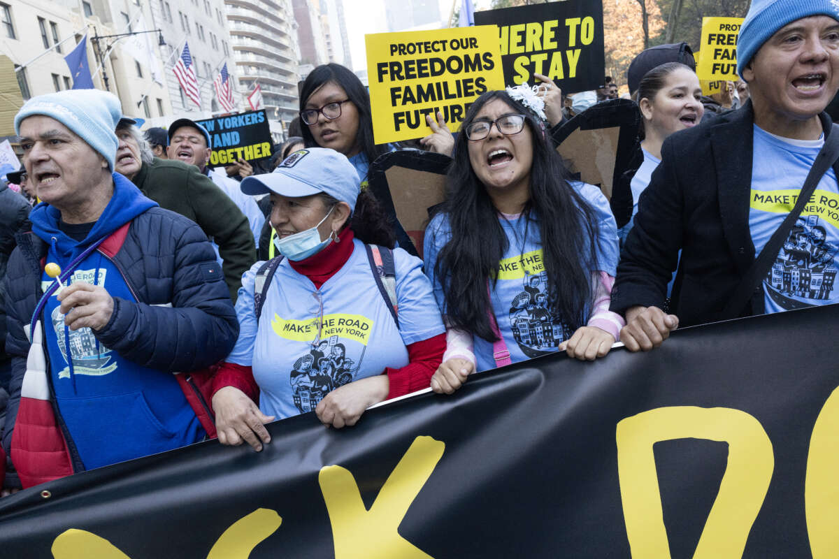 Immigrant rights supporters join an anti-Trump protest march in anticipation of the newly elected president's immigration policies on November 9, 2024, in midtown New York City.