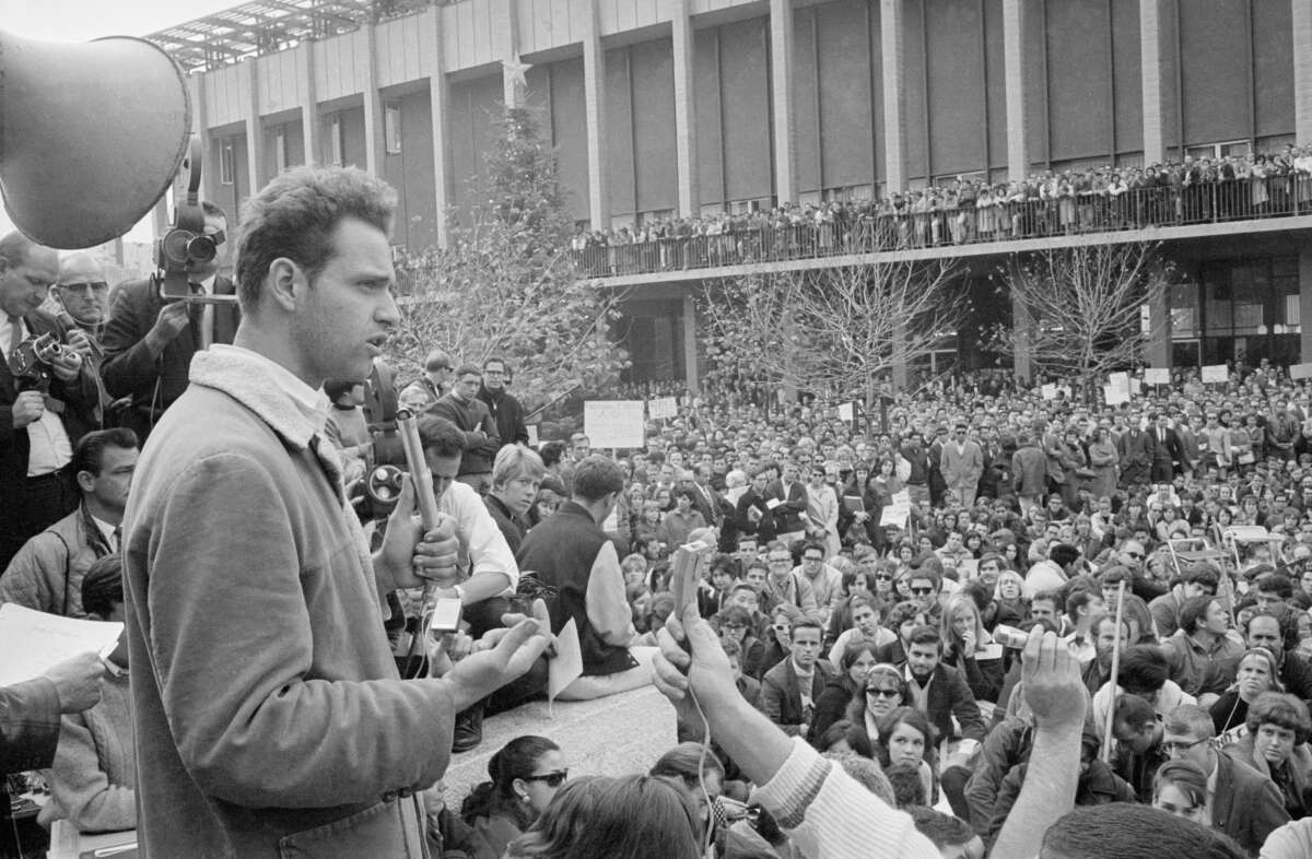 Mario Savio, one of the leaders of the Free Speech Movement at the University of California, tells 5,000 persons at a rally that the group will continue efforts to expand political freedom on the campus.