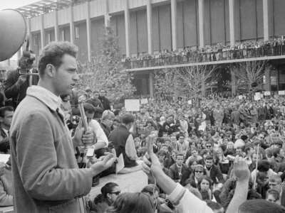 Mario Savio, one of the leaders of the Free Speech Movement at the University of California, tells 5,000 persons at a rally that the group will continue efforts to expand political freedom on the campus.