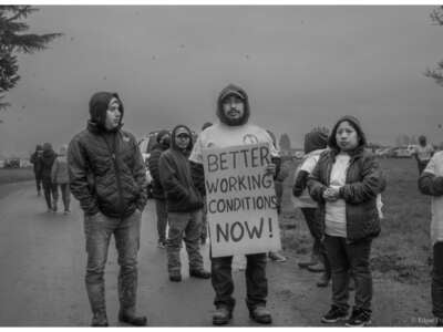 Benito Lopez, a Familias Unidas por la Justicia union member, at a picket line during a strike at a Tulip farm in Mount Vernon, Washington, in March 2022.