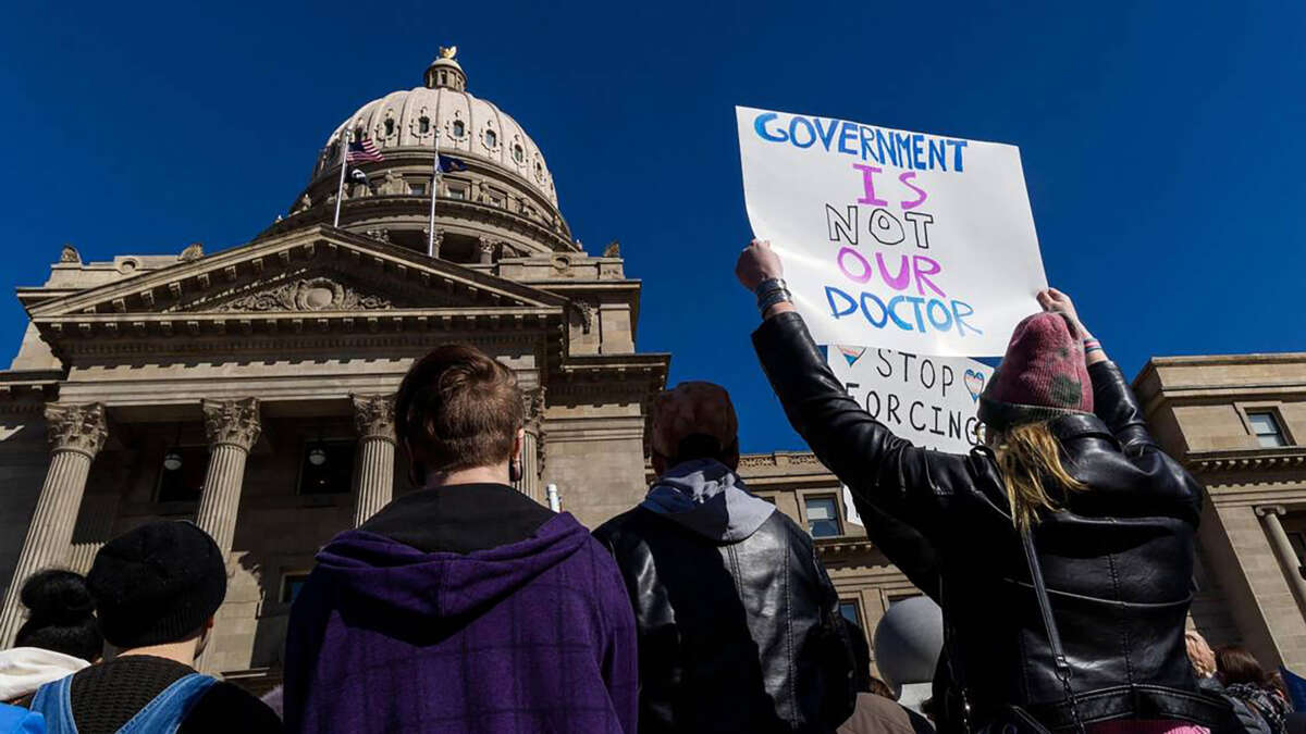 More than 300 people gathered in front of the Idaho Capitol in opposition to anti-transgender legislation.