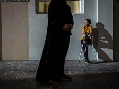 A Palestinian child from Gaza is pictured at a temporary housing compound in Doha, Qatar, on April 12, 2024.