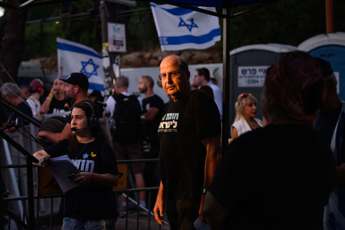 Former Israeli Minister of Defense and IDF Chief of Staff Moshe Ya'alon waits to take the stage before speaking at a rally against the Netanyahu government outside the Knesset on June 18, 2024, in Jerusalem.