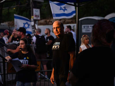 Former Israeli Minister of Defense and IDF Chief of Staff Moshe Ya'alon waits to take the stage before speaking at a rally against the Netanyahu government outside the Knesset on June 18, 2024, in Jerusalem.