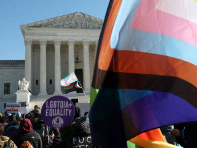 Transgender rights supporters and opponents rally outside of the U.S. Supreme Court as the high court hears arguments in a case on transgender health rights on December 4, 2024, in Washington, D.C.