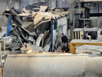 People check the damage outside the Kamal Adwan hospital in Beit Lahya in the northern Gaza Strip, following a reported Israeli strike that hit the medical complex on December 6, 2024.